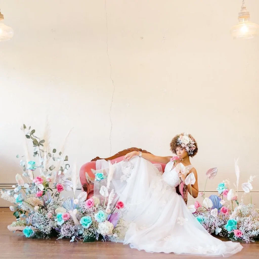 April showers might bring May flowers but we are obsessed with these vibrant florals captured by pro Austin wedding photog